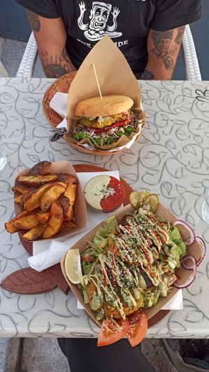 Cheakpea fritters, potato and club burger at Public Bar & Vegan Kitchen in Bled