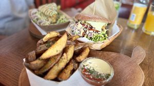 Wedges and burger   at Public Bar & Vegan Kitchen in Bled