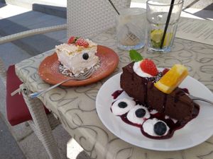 "Bleder Schnitte" (creme cake) and a chocolate cake at Public Bar & Vegan Kitchen in Bled