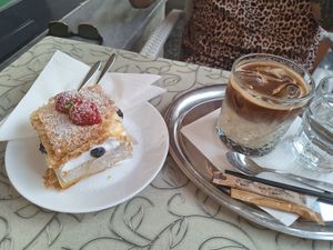 Cream cake and Ice Coffee at Public Bar & Vegan Kitchen in Bled