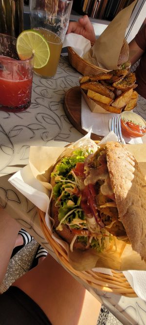 Burger with onion and buckwheat bun at Public Bar & Vegan Kitchen in Bled