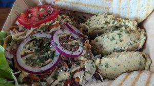 Hummus with the gluten free bread option at Public Bar & Vegan Kitchen in Bled