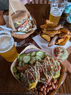 Chickpea patties, fries, burger at Public Bar & Vegan Kitchen in Bled