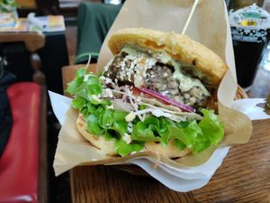 Buckwheat & mushroom patty in a corn bread bun at Public Bar & Vegan Kitchen in Bled