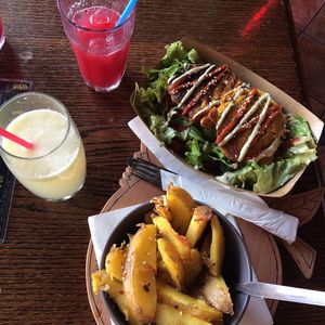 Lemonade, watermelon juice, potato wedges and chickpea fritters on salad - all amazingly delicious  at Public Bar & Vegan Kitchen in Bled