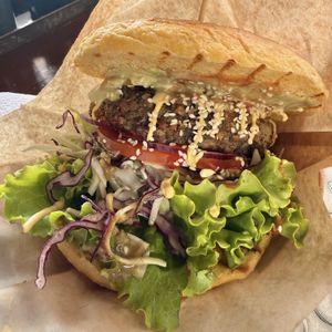 ‘Public’ burger (buckwheat, mushroom, leak potato) on a corn bun  at Public Bar & Vegan Kitchen in Bled