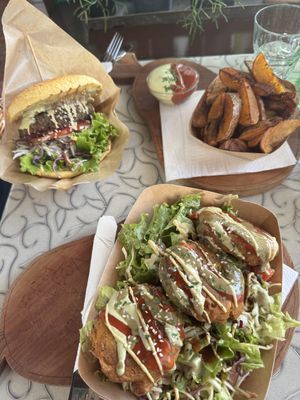 Public Burger, wedges, chickpea fritterss made  at Public Bar & Vegan Kitchen in Bled