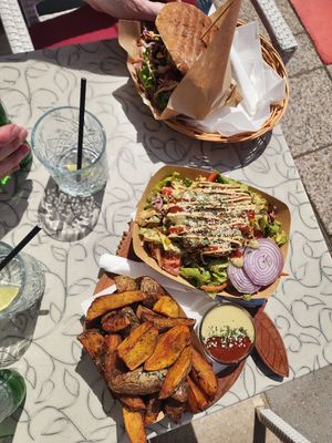 Sweet potato burger, salad and amazing wedges at Public Bar & Vegan Kitchen in Bled