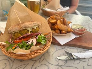 Burger and bled cake.  at Public Bar & Vegan Kitchen in Bled