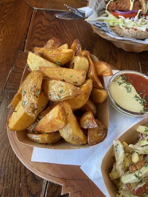 Potato wedges DELICIOUS (and that little sauce was so good!)  at Public Bar & Vegan Kitchen in Bled