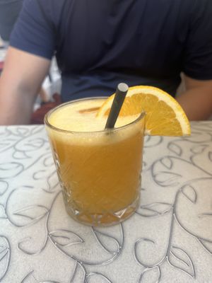 Orange juice   at Public Bar & Vegan Kitchen in Bled