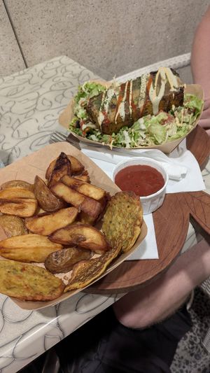 Wedges and chickpea fritters (kids menu) + potato pie and salad at Public Bar & Vegan Kitchen in Bled