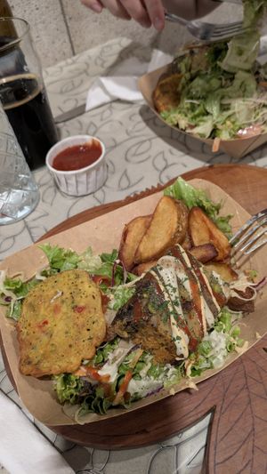 Shared wedges and chickpea fritters (kids menu) + potato pie and salad at Public Bar & Vegan Kitchen in Bled