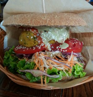 Club burger with spelt bun at Public Bar & Vegan Kitchen in Bled