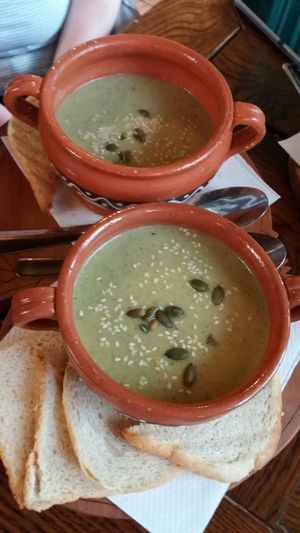 Soup with bread at Public Bar & Vegan Kitchen in Bled
