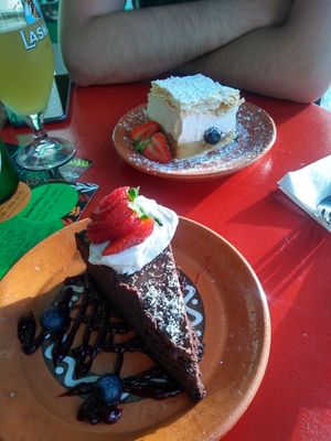 Vegan cremsnita and vegan chocolate cake at Public Bar & Vegan Kitchen in Bled