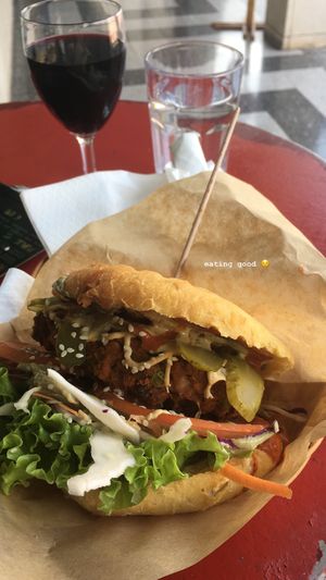 house burger on corn bun!! at Public Bar & Vegan Kitchen in Bled