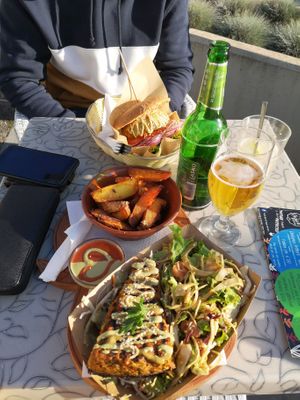 Potato pie and burger  at Public Bar & Vegan Kitchen in Bled