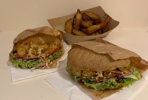 Vegan burgers with buckwheat bun and public and club patties at Public Bar & Vegan Kitchen in Bled