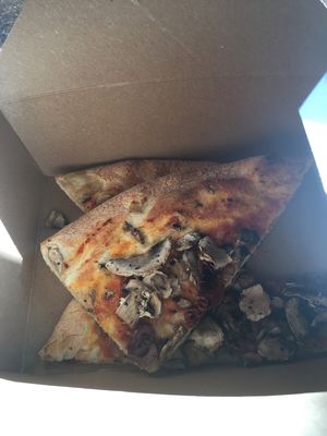 Vegan pizza leftovers with sun dried tomatoes added at American Flatbread in Canton