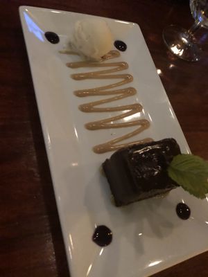 Ganache with PB drizzle and vanilla ice cream at Blossom Restaurant Chelsea in New York City