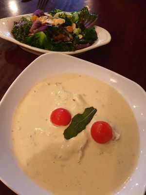 Ravioli with a side of kale, squash and almonds at Blossom Restaurant Chelsea in New York City