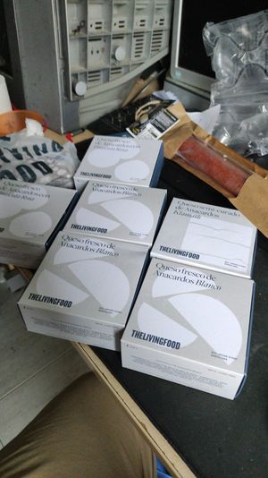 Varios quesos y embutido ahumado. at THELIVINGFOOD in Barcelona