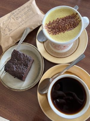 Cheese, brownie, turmeric latte and long black  at MOA Bakery Cakery in Oamaru