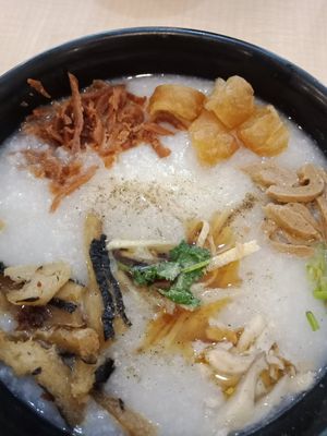 Nature's special porridge. Super delicious rice congee topped with yao char koay (fried dough), mushrooms, mock meat and fish, sliced ginger and sesame oil. Even meat eaters love t at Nature's Recipe Cafe in Petaling Jaya