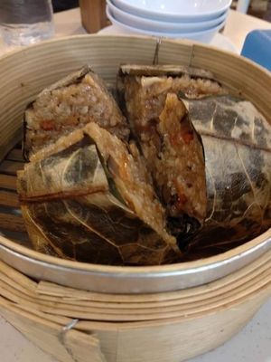 Lotus leaf sticky rice. Soft sticky rice with mushrooms and mock meat, wrapped in lotus leaf. Very good. at Nature's Recipe Cafe in Petaling Jaya