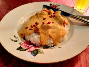 Fried cauliflower with walnut sauce, served over grits at Kafe Leila in Tbilisi