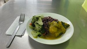 Wonderful meal for 30 Baht.  Brown rice, veggies, and pumpkin.  at Jiya Chai in Phuket