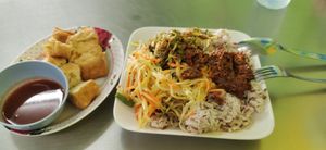 Tofu, spring rolls, vegetables rice, sauce at Jiya Chai in Phuket