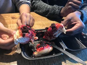 Sharing a Raspberry Chocolate doughnut  at The Cold Pressery in Mississauga