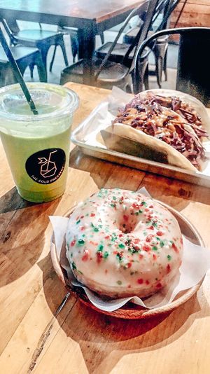Candy cane donut, tropical green smoothie & chipolet tacos  at The Cold Pressery in Mississauga