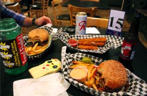 Western burger, bbq sandwich, cheese sticks! so good! at Black Water Bar in Portland