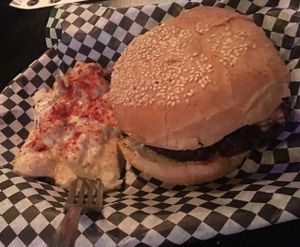 Peanut butter and tempeh bacon burger with potatoe salad at Black Water Bar in Portland