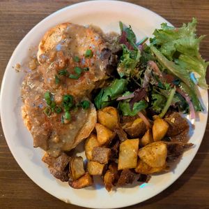 biscuits and gravy, smoked paprika home fries, and hibiscus vinaigrette salad at Black Water Bar in Portland