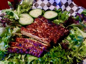 Baked tempeh on greens at Black Water Bar in Portland