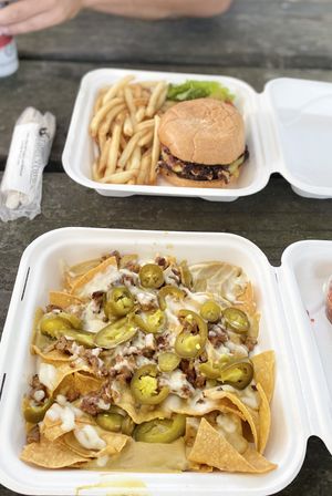 Nachos & Western Burger— enjoyed the take out in a nearby park ☺️🌱 at Black Water Bar in Portland
