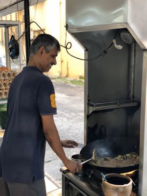 Famous ah Hua fried kway Teow at Blue Boy Vegetarian Food Centre in Kuala Lumpur