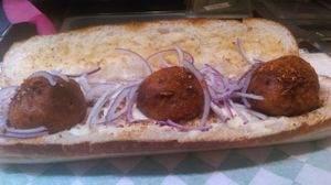 Vegan Vada Pav on our home made Vegan wheat bread, Vegan Cheese and Vada (balls). at Pizza & Sub Stop in Lowell