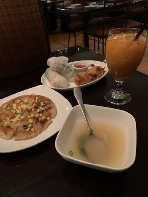 Scallion pancake, roll sampler, and Thai iced tea 😍 at Zhu's Vegan Kitchen in Arlington