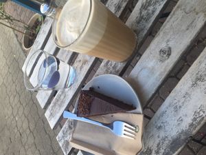 Soy shakerato and vegan GF chocolate cake  at Schondorf Bio Cafe in Bratislava