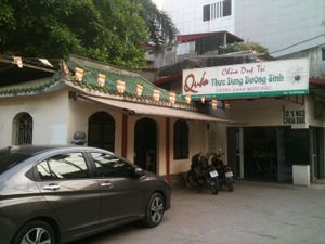 View of the restaurant from outside. The pagoda is on the left and there is another pagoda building on the right. at Chua Due Tu in Hanoi