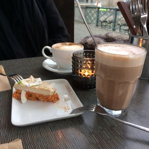 Delicious carrot cake, with hot chocolate  at Open New Doors in Gothenburg