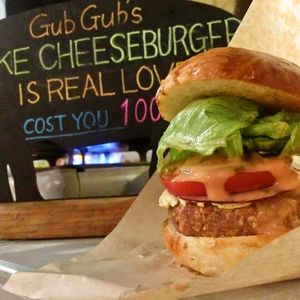 Fake Cheeseburger is Real Love.  Cost you... at GubGub's Vegan Kitchen in Yomitan