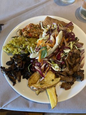 salad, tempeh, potato croquette, mushroom, and 2 bean dishes   at 100% Bio in Rome