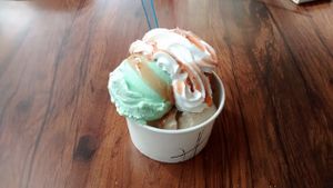 Ice creams: mint, coffee, banana with Jack Daniel's, strawberry sauce and Chantilly cream at Las Vegans in Paris