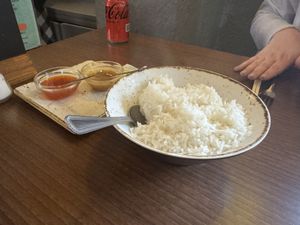 Boiled rice, sweet chilli and peanut satay dips  at Peaches Restaurant in Newcastle-under-lyme